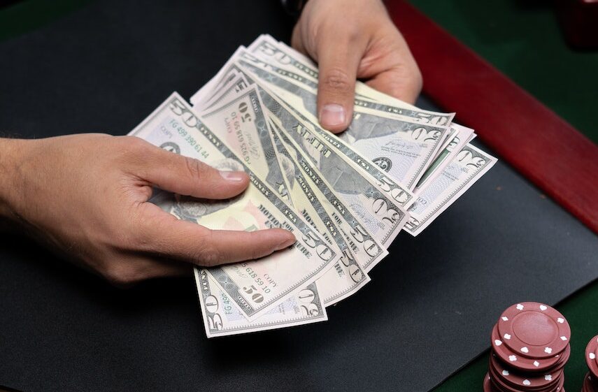 High Angle Shot of Counting Banknotes