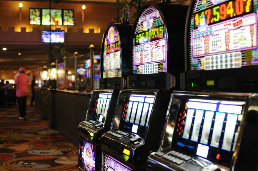 a row of slot machines in a casino